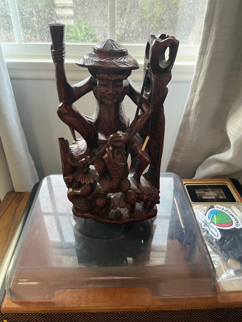 Hand-Carved Brown Wooden Fisherman Sculpture - Unbranded